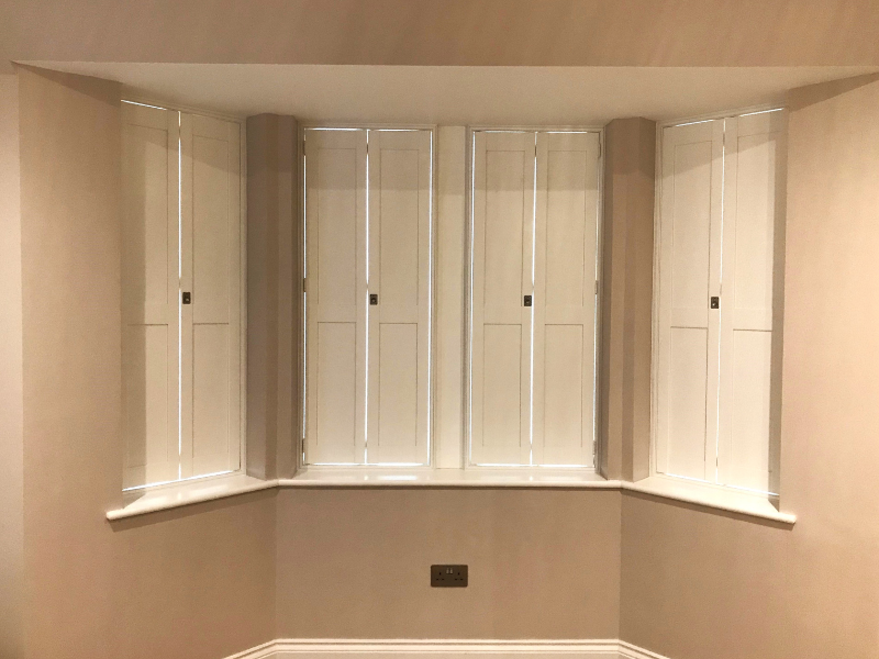Bay Window Shutters in Thames Ditton, Surrey | Solid Shaker Shutters