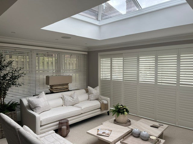 Tracked shutters fitted across a wide opening