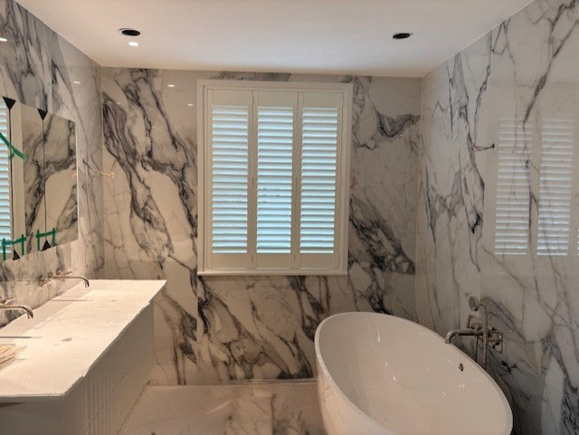 Plantation shutters fitted to a Buckinghamshire bathroom window