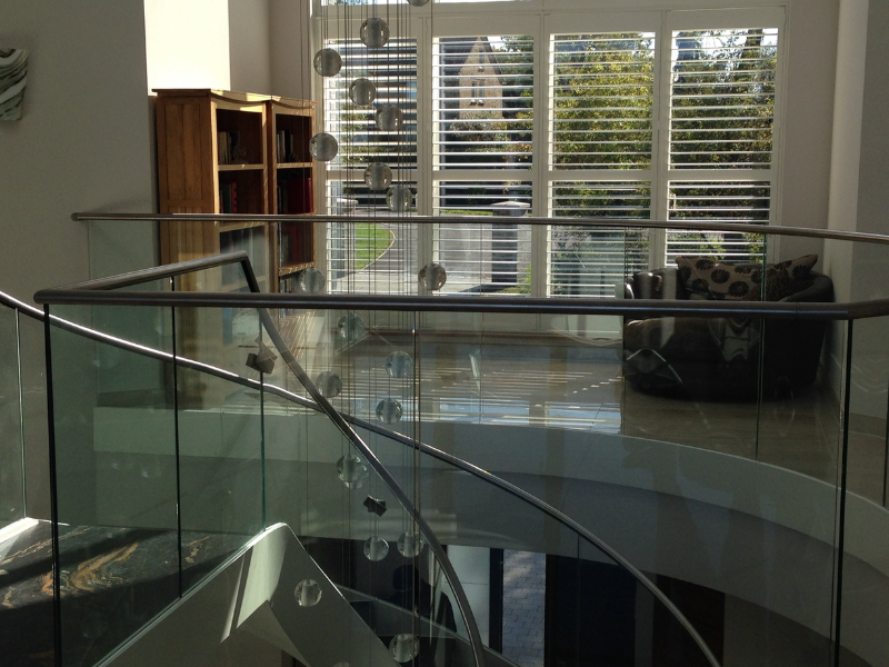 Gable-end window shutter solution in a Beaconsfield home