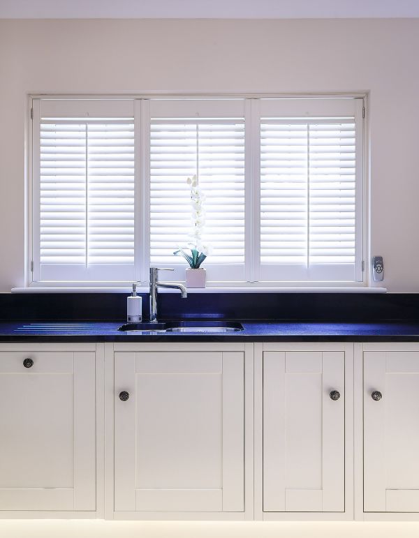 Full height shutters in a kitchen