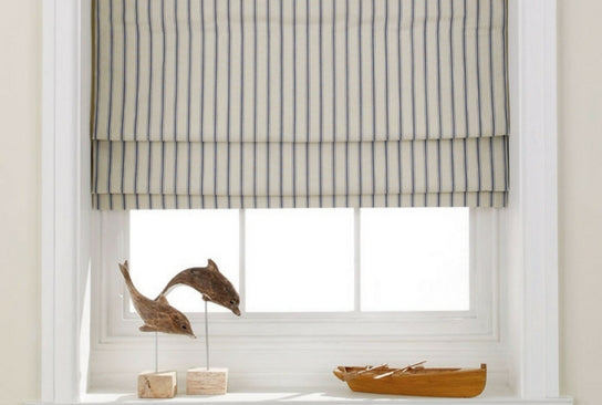 Tailored Roman blinds in a contemporary interior