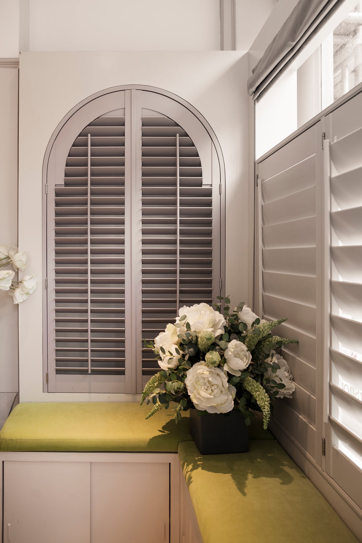 Shutter samples displayed inside The Shutter Shop Fulham showroom