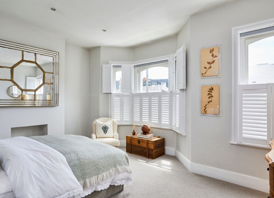Shutters in a calm bedroom